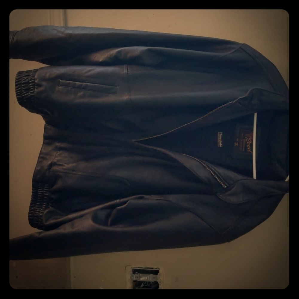 A vintage Reed's men's leather tote thinsulated.